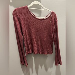 Pink long sleeve with crossing in back size medium